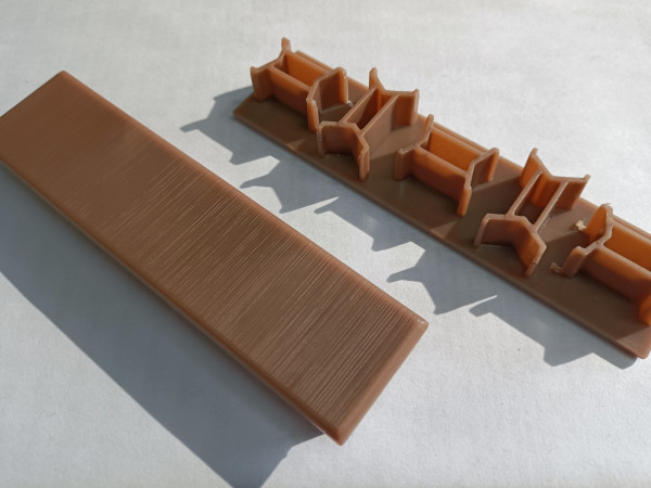 Eindkap voor aluminium co-extrusieplaat teak